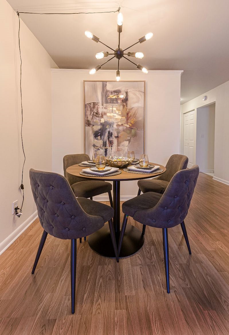 Furnished dining area with seating for four